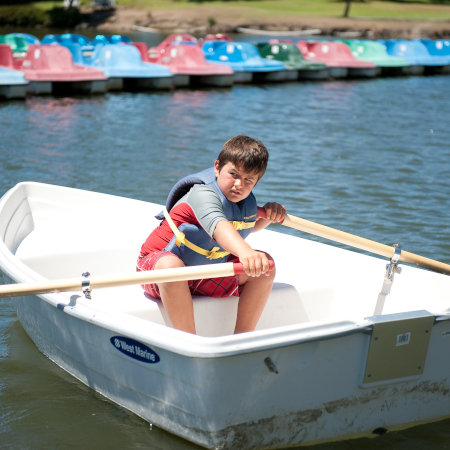 Rowing a boat.